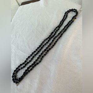 Long vintage hand knotted black bead necklace